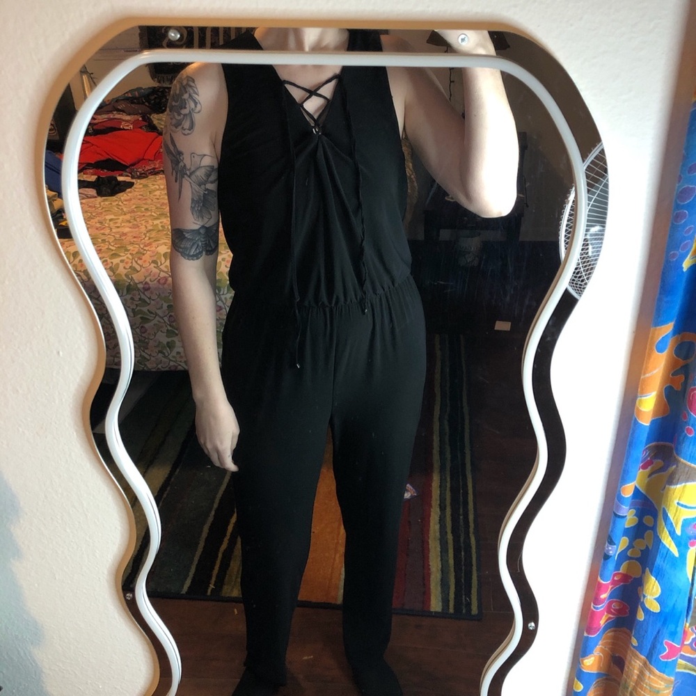 Black jumpsuit with lace up detailing